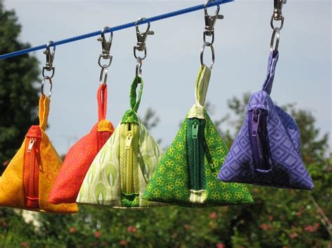 miniature pyramid handbags.